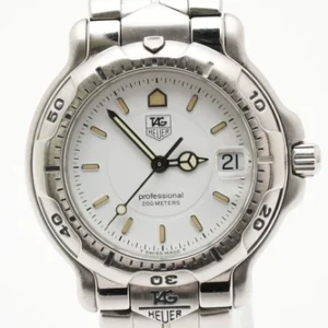 Silver TAG Heuer wristwatch with white dial and date display.