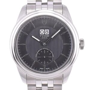 Elegant silver wristwatch with a black dial and date display.